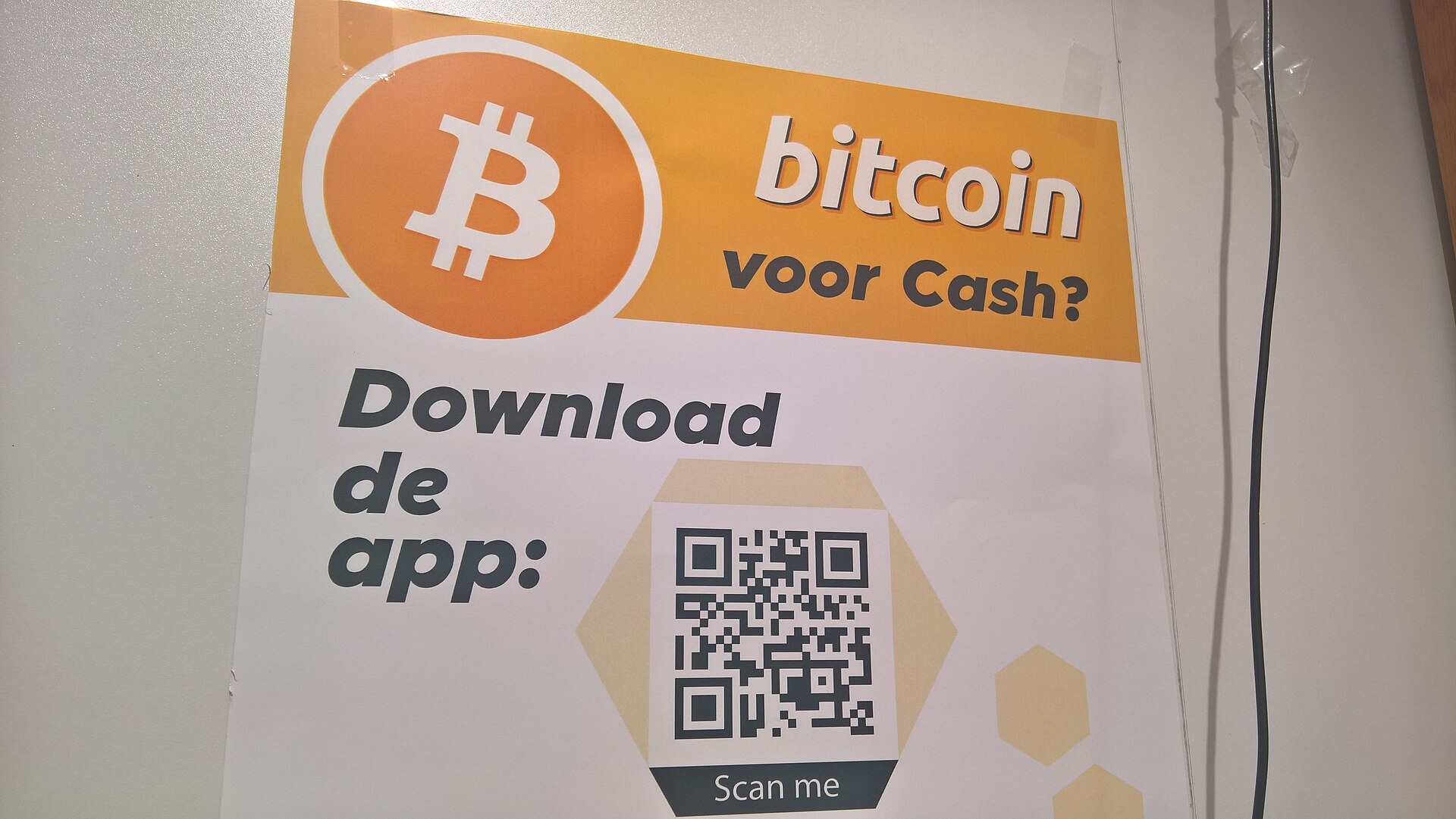 A digital bitcoin coin above a global network grid