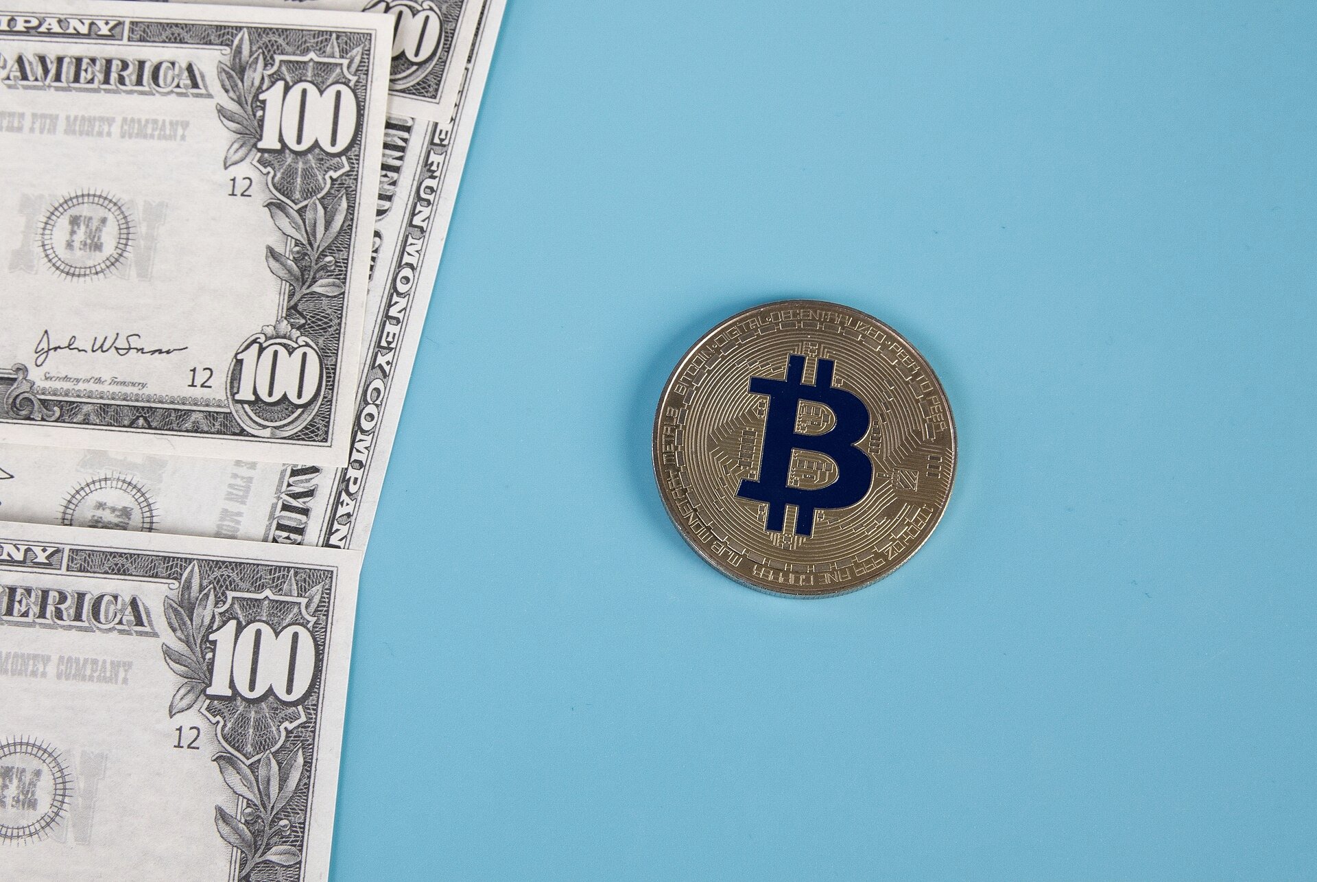 A glowing digital coin suspended above an illuminated global data network
