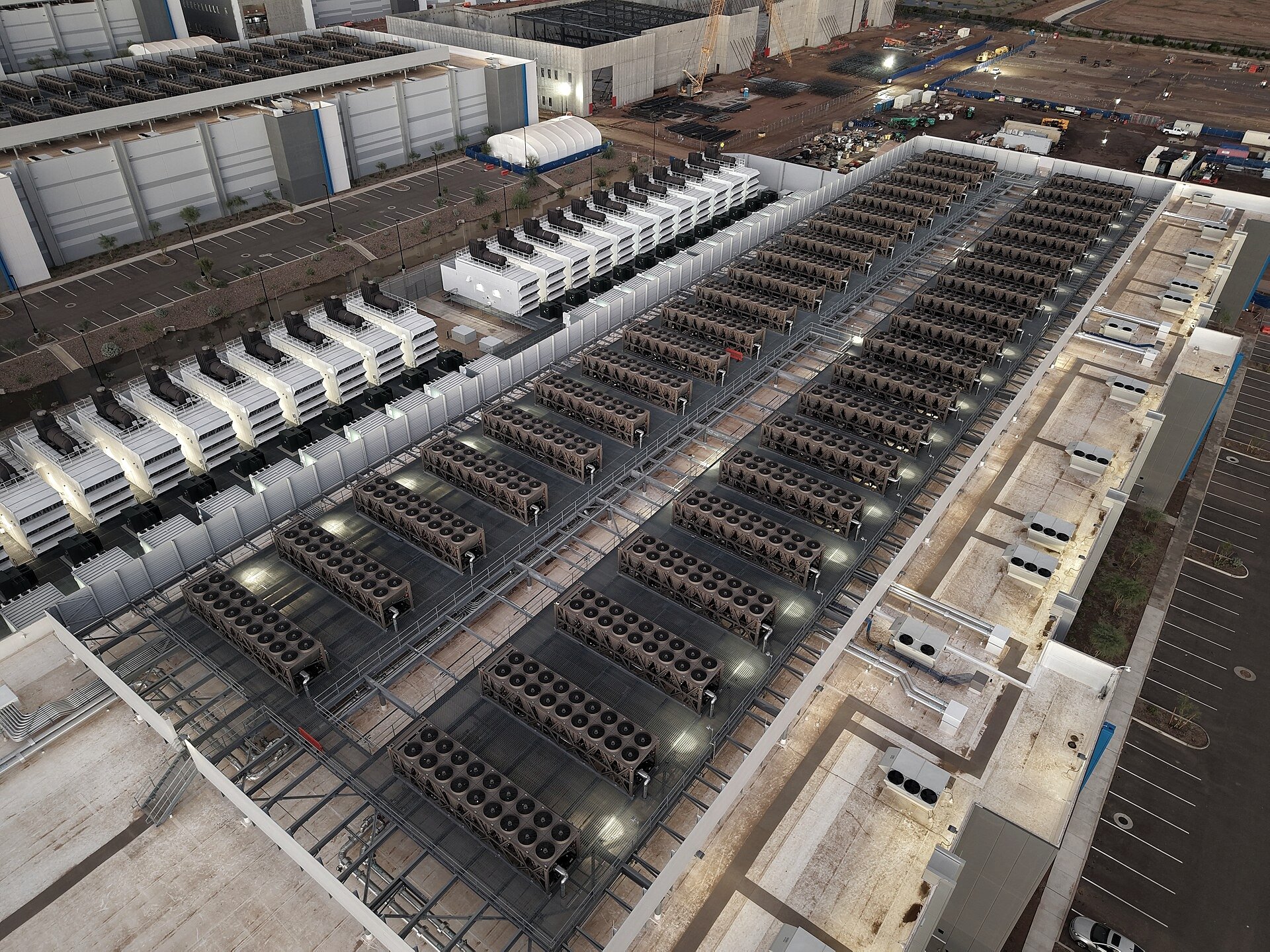 Rows of illuminated servers in a data centre